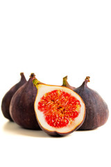 Fresh figs. Fruit with half isolated on white.