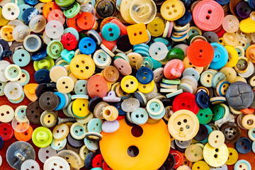 Fototapeta na wymiar Close up of sewing colorful buttons background