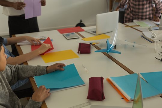 Male pilot training kids in training institute