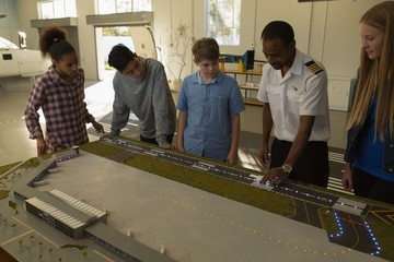 Male pilot training about model plane