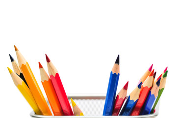 Colored pencils in pencil case isolated on white background.
