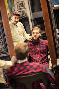 Client grooming beard and moustache .