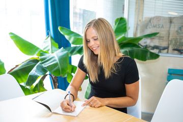 Young entrepreneur preparing her business idea