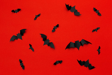 Fototapeta na wymiar halloween and decoration concept - paper bats flying
