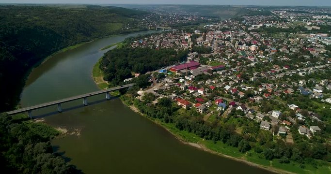 Aerial view of the summer Dnister river bend canyon and famous Ukrainian Zalischyky town. Ternopil region, Ukraine, Europe.