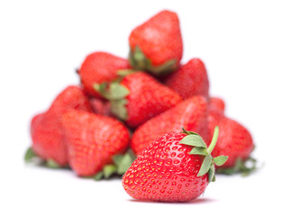 big handful of strawberries isolated