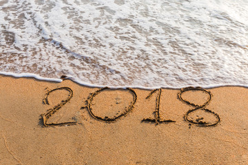 2018 on a beach sand