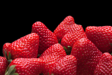 big handful of strawberries isolated