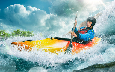 Obraz premium Whitewater kayaking, extreme kayaking