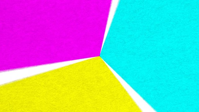 urple yellow & teal paper spinning in a rotating wheel of textured color rough paper triangle shapes in a CGI high definition motion video clip