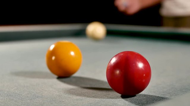 Green billiard table playing the balls for victory 