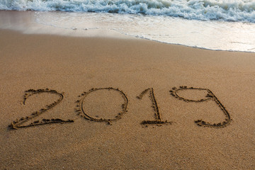 2019  on a beach sand  background