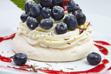 Meringue cake Pavlova with blueberry
