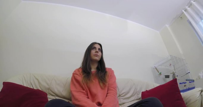 Woman is looking forward blankly