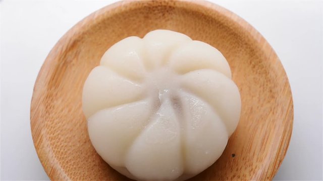 top view white morden moon cake rotating close up