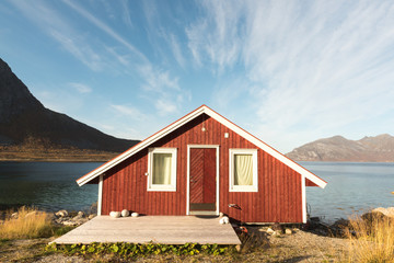Fototapeta na wymiar Wooden Beach Hut in Tromso Fjord, Norway