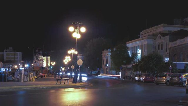 Time lapse of car head lights at sea side town Mitilini on Lesvos island