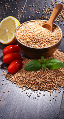 Bowl of amaranth grain on wooden table
