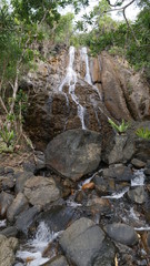 Fototapeta na wymiar 33/5000 Detail of a waterfall in Sabang