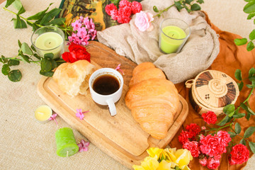 Flat lay composition with coffee and croissants.