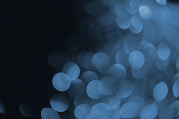 abstract dark background with beautiful blue bokeh