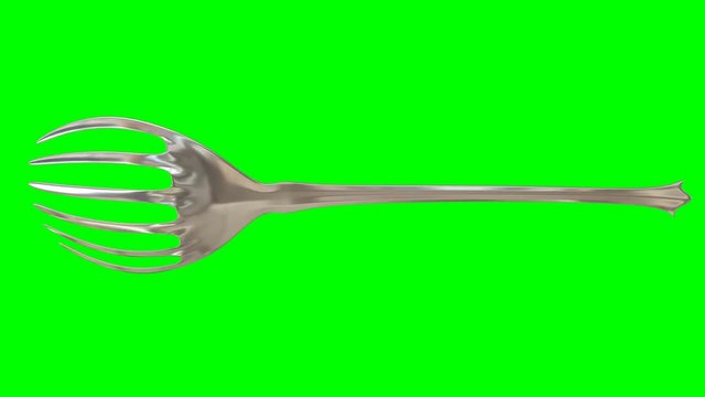 Animated rotating around x axis simple shining silver serving fork against green background. Full 360 degree spin, loop able and isolated.
