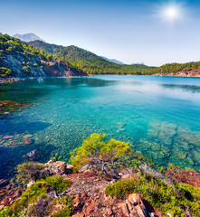 Obraz premium Splendid Mediterranean seascape in Turkey. Sunny view of a small azure bay near the Tekirova village, District of Kemer, Antalya Province.