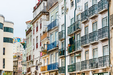Fototapeta na wymiar Lisbon, Portugal.- February 11, 2018: Old Town Lisbon. street view of typical houses in Lisbon, Portugal, Europe