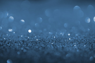 abstract beautiful background with blue glitter and bokeh