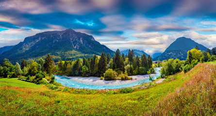 Colorful summer panorama of the Triglav mountain range