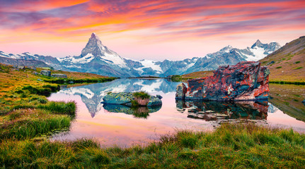 Colorful summer panorama of the Stellisee lake.