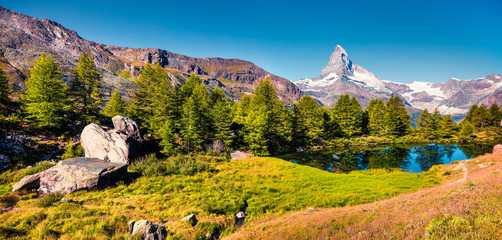 Beautiful summer panorama of the Grindjisee lake.
