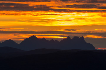 Colourful sky with mountains