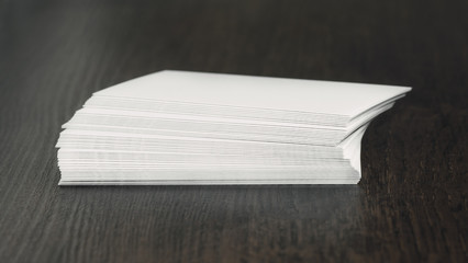 Business cards blank white on a wooden table