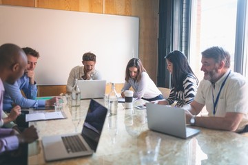 Business people working in conference room