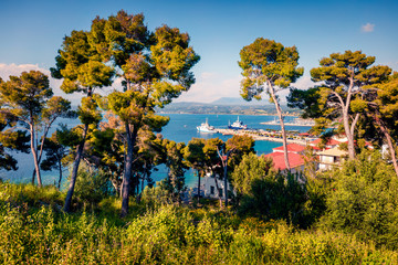 Picturesque morning view of Pilos town. Colorful spring scene of the Ionian Sea. Beautiful cityscape of Greece city. Traveling concept background. Artistic style post processed photo.