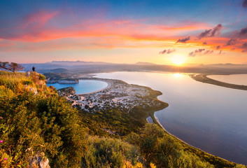 Colorful spring view of the Voidokilia beach from Navarino Castle. Great sunrise on the Ionian Sea,...