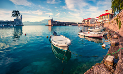 Colorful spring view of the Nafpaktos port. Fantastic morning scene of the Gulf of Corinth, Greece, Europe. Beauty of countryside concept background. Beauty of countryside concept background. - obrazy, fototapety, plakaty