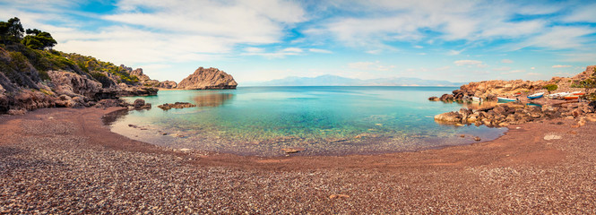 Impressive spring panorama on the cozy beach in northeastern Corinthia, Greece. Sunny outdoor scene...