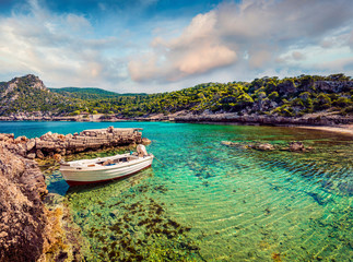 Colorful spring panorama on the cozy beach in northeastern Corinthia, Greece. Sunny outdoor scene...