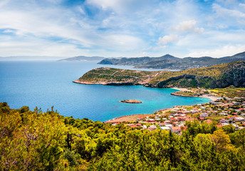 Fototapeta na wymiar Aerial view of Paralia Kakis Thalassis village. Colorful spring seascape of Aegean sea. Sunny morning scene of the Greece, Europe. Beauty of nature concept background.