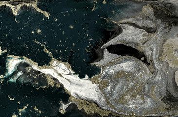 Marble abstract acrylic background. Marbling artwork texture. Agate ripple pattern. Gold powder.
