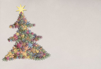 Vintage transparent paper star in form of a christmas tree for christmas greetings or advertising