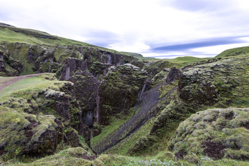 Fototapeta na wymiar Fjadrargljufur Canyon, Fjaðrárgljúfur is a magnificent and massive canyon, view from top