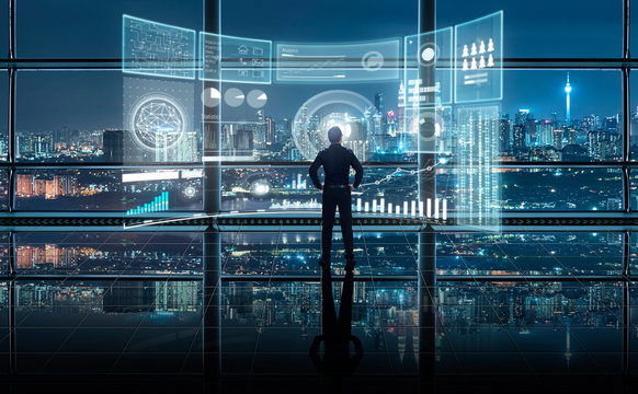 Smart financial analytics working at modern office with big data ,connections icon, internet of things, financial charts and graph virtual screen.