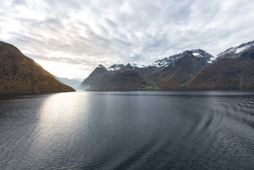 norwegian fjord with mountains and water, view from hurtigruten ship boat, norway, europe