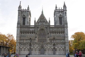 norwegian fjord with old church in trondheim, norway, europe, nidaros cathedral west front