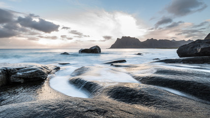 Fototapeta na wymiar norwegian uttakleiv beach, long time exposure, sunset, white sand beach, norway, europe, lofots, lofoten