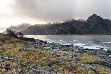 Fototapeta na wymiar norwegian beach with mountains in backhround, sunset, beach, norway, europe, lofots, lofoten