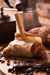 Croissants on a rustic wooden table